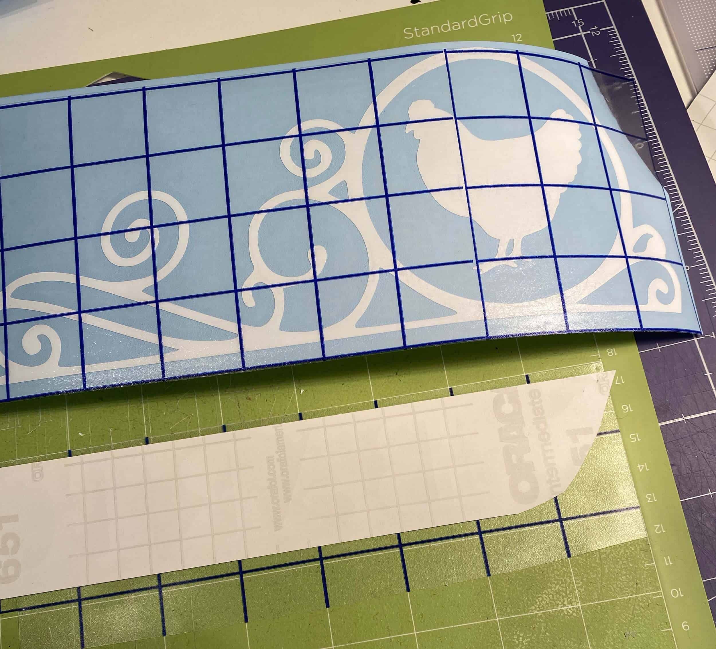 transfer sheet applied to vinyl design to transfer to mailbox