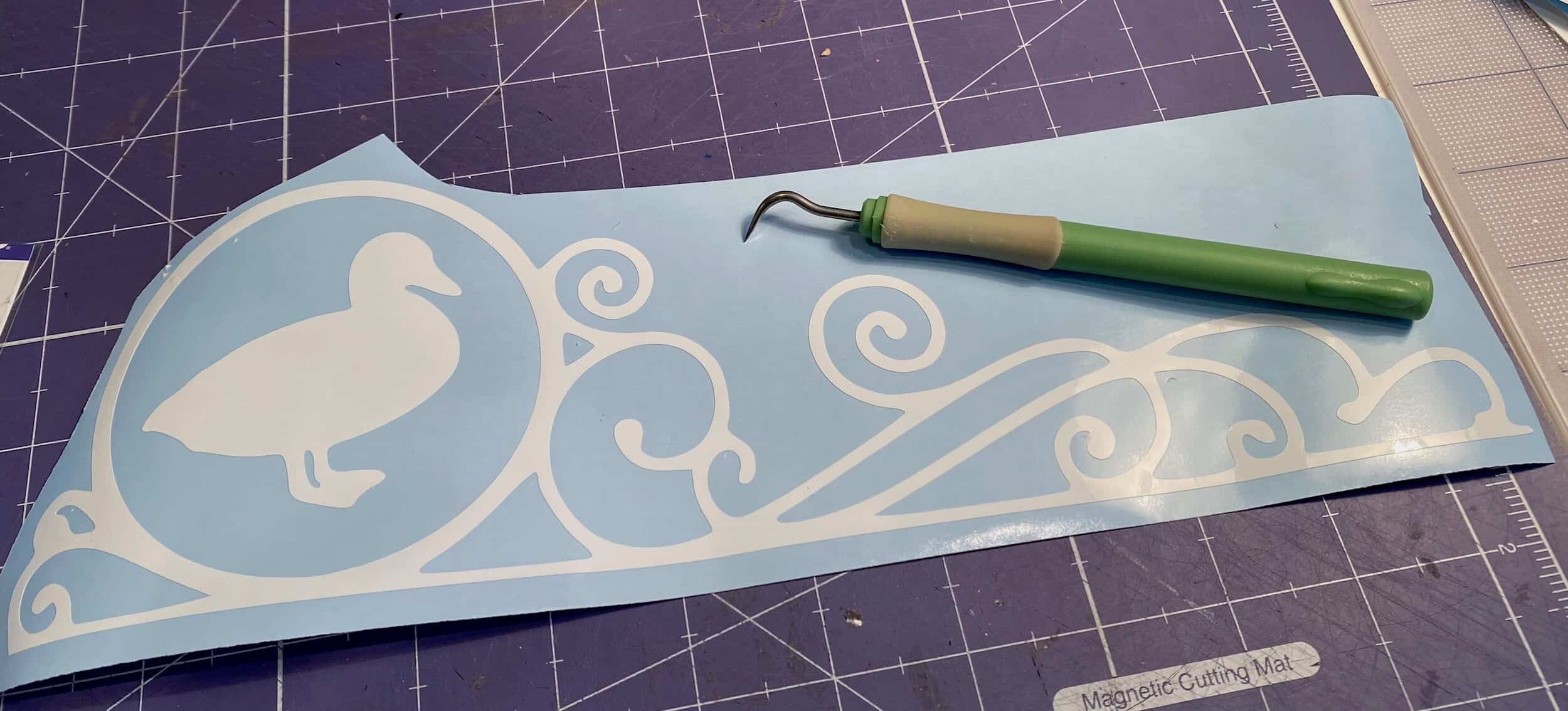 weeding vinyl with cricut weeding tools